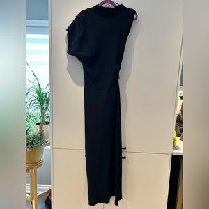 Floor length Navy blue dress. Unique eye stopper with its shoulders